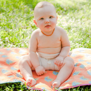Baby wearing Organic Cloth Diaper Prefolds - GeffenBaby.com