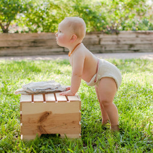 Baby wearing Organic Cloth Diaper Prefolds - GeffenBaby.com